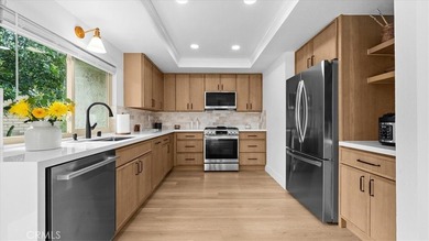 Stunning fully remodeled 3 bedroom, 3 bath townhouse showcasing on Mission Viejo Country Club in California - for sale on GolfHomes.com, golf home, golf lot