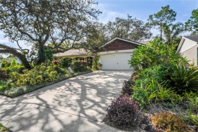 Welcome to this beautifully landscaped corner lot home located on Beacon Woods Golf Club in Florida - for sale on GolfHomes.com, golf home, golf lot