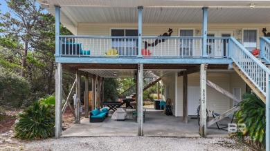 Charming 5-bedroom, 3-bath coastal home located just a short on Kiva Dunes Golf Club in Alabama - for sale on GolfHomes.com, golf home, golf lot