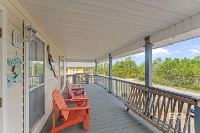 Charming 5-bedroom, 3-bath coastal home located just a short on Kiva Dunes Golf Club in Alabama - for sale on GolfHomes.com, golf home, golf lot