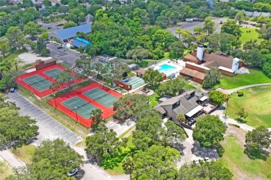Welcome to this beautifully landscaped corner lot home located on Beacon Woods Golf Club in Florida - for sale on GolfHomes.com, golf home, golf lot