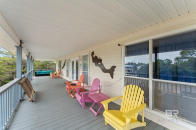 Charming 5-bedroom, 3-bath coastal home located just a short on Kiva Dunes Golf Club in Alabama - for sale on GolfHomes.com, golf home, golf lot
