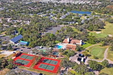Welcome to this beautifully landscaped corner lot home located on Beacon Woods Golf Club in Florida - for sale on GolfHomes.com, golf home, golf lot