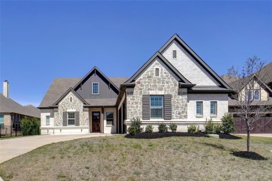 Experience resort-style living in this stunning 4-bedroom, 2 on The Golf Club at Resort Eagle Mountain Lake in Texas - for sale on GolfHomes.com, golf home, golf lot