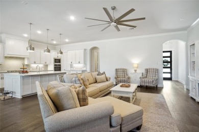 Experience resort-style living in this stunning 4-bedroom, 2 on The Golf Club at Resort Eagle Mountain Lake in Texas - for sale on GolfHomes.com, golf home, golf lot