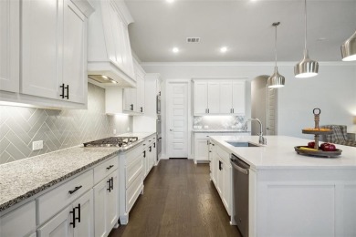 Experience resort-style living in this stunning 4-bedroom, 2 on The Golf Club at Resort Eagle Mountain Lake in Texas - for sale on GolfHomes.com, golf home, golf lot