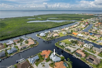 Nestled on Curacao Ct in Punta Gorda Isles, this Fero built 3/3 on Saint Andrews South Golf Club in Florida - for sale on GolfHomes.com, golf home, golf lot