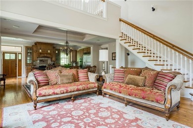 Welcome HOME to this elevated 6 bedroom, 4.5 bathroom chalet in on Coweta Club in Georgia - for sale on GolfHomes.com, golf home, golf lot