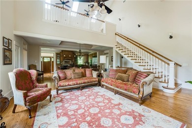 Welcome HOME to this elevated 6 bedroom, 4.5 bathroom chalet in on Coweta Club in Georgia - for sale on GolfHomes.com, golf home, golf lot