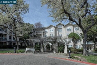 This rare first-floor Brookgreen model offers a spacious on Rossmoor Golf Course in California - for sale on GolfHomes.com, golf home, golf lot