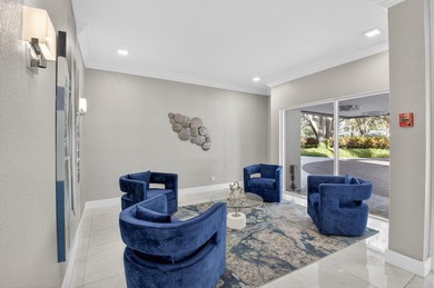 Completely renovated and refined, this two-bedroom, two-bath on Boca West Golf and Country Club in Florida - for sale on GolfHomes.com, golf home, golf lot