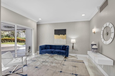 Completely renovated and refined, this two-bedroom, two-bath on Boca West Golf and Country Club in Florida - for sale on GolfHomes.com, golf home, golf lot