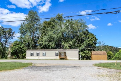 Single wide trailer on .340 acres in Pleasants County, West on Saint Marys Golf Club in West Virginia - for sale on GolfHomes.com, golf home, golf lot