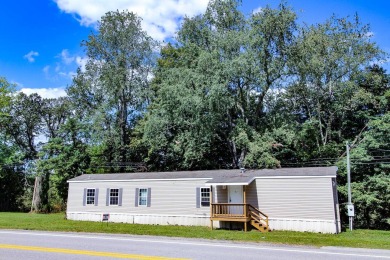 Single wide trailer on .340 acres in Pleasants County, West on Saint Marys Golf Club in West Virginia - for sale on GolfHomes.com, golf home, golf lot