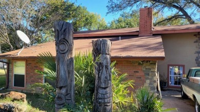 Waterfront home on Cedar Creek Lake.   Ready for a makeover to on Pinnacle Golf and Boat Club in Texas - for sale on GolfHomes.com, golf home, golf lot