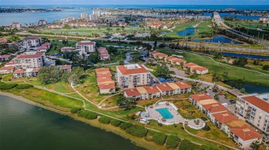 Located in the walkable and charming island community of Isla on Isla Del Sol Yacht and Country Club in Florida - for sale on GolfHomes.com, golf home, golf lot
