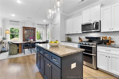 Welcome to 3204 Carnoustie, a beautifully appointed home located on Gates Four Golf and Country Club in North Carolina - for sale on GolfHomes.com, golf home, golf lot