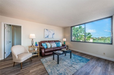 Located in the walkable and charming island community of Isla on Isla Del Sol Yacht and Country Club in Florida - for sale on GolfHomes.com, golf home, golf lot