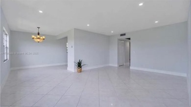 Buyer fell through--this beautifully updated corner unit is on Flamingo Lakes Country Club in Florida - for sale on GolfHomes.com, golf home, golf lot