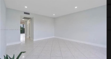 Buyer fell through--this beautifully updated corner unit is on Flamingo Lakes Country Club in Florida - for sale on GolfHomes.com, golf home, golf lot