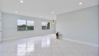 Buyer fell through--this beautifully updated corner unit is on Flamingo Lakes Country Club in Florida - for sale on GolfHomes.com, golf home, golf lot