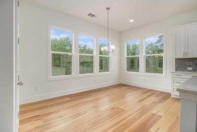 Experience Elevated Living in This Rare, Brand-New Toll Brothers on Capital City Club Crabapple in Georgia - for sale on GolfHomes.com, golf home, golf lot