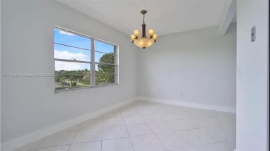 Buyer fell through--this beautifully updated corner unit is on Flamingo Lakes Country Club in Florida - for sale on GolfHomes.com, golf home, golf lot