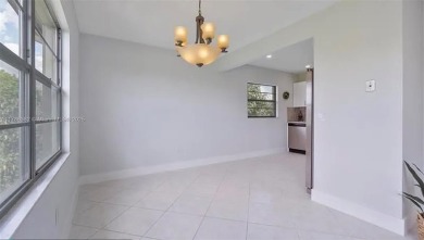 Buyer fell through--this beautifully updated corner unit is on Flamingo Lakes Country Club in Florida - for sale on GolfHomes.com, golf home, golf lot