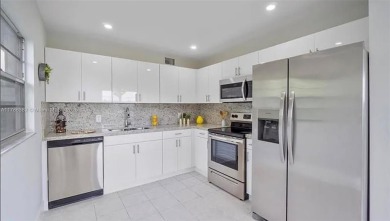 Buyer fell through--this beautifully updated corner unit is on Flamingo Lakes Country Club in Florida - for sale on GolfHomes.com, golf home, golf lot