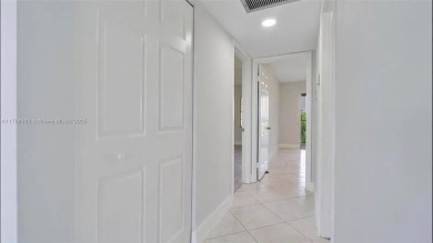 Buyer fell through--this beautifully updated corner unit is on Flamingo Lakes Country Club in Florida - for sale on GolfHomes.com, golf home, golf lot