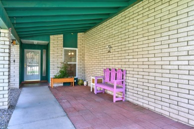 Welcome to this charming home offering tons of updates! Enter on Arroyo Del Oso Golf Course in New Mexico - for sale on GolfHomes.com, golf home, golf lot