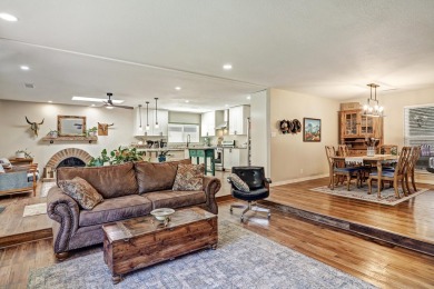 Welcome to this charming home offering tons of updates! Enter on Arroyo Del Oso Golf Course in New Mexico - for sale on GolfHomes.com, golf home, golf lot