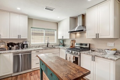 Welcome to this charming home offering tons of updates! Enter on Arroyo Del Oso Golf Course in New Mexico - for sale on GolfHomes.com, golf home, golf lot
