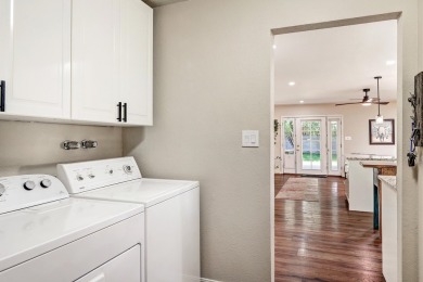Welcome to this charming home offering tons of updates! Enter on Arroyo Del Oso Golf Course in New Mexico - for sale on GolfHomes.com, golf home, golf lot