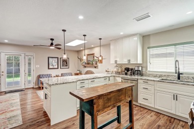 Welcome to this charming home offering tons of updates! Enter on Arroyo Del Oso Golf Course in New Mexico - for sale on GolfHomes.com, golf home, golf lot