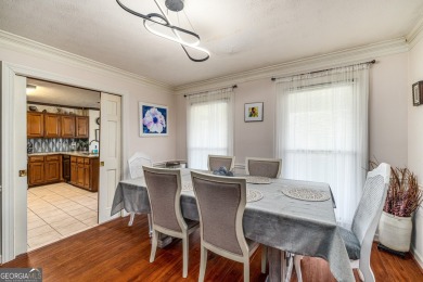This beautiful ranch-styled home is nestled in the Exclusive on Southland Country Club in Georgia - for sale on GolfHomes.com, golf home, golf lot