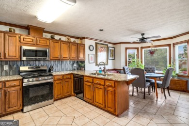 This beautiful ranch-styled home is nestled in the Exclusive on Southland Country Club in Georgia - for sale on GolfHomes.com, golf home, golf lot