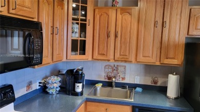 Best price furnished Beautiful Golf and lake view from this on Turnberry Isle Resort and Club in Florida - for sale on GolfHomes.com, golf home, golf lot