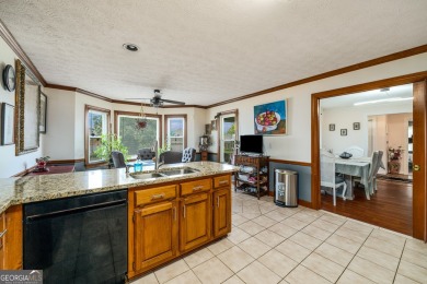 This beautiful ranch-styled home is nestled in the Exclusive on Southland Country Club in Georgia - for sale on GolfHomes.com, golf home, golf lot