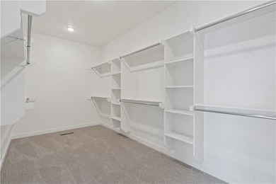 Introducing *Avalon,* where the timeless appeal of main-level on Heritage Park Golf Course in Kansas - for sale on GolfHomes.com, golf home, golf lot