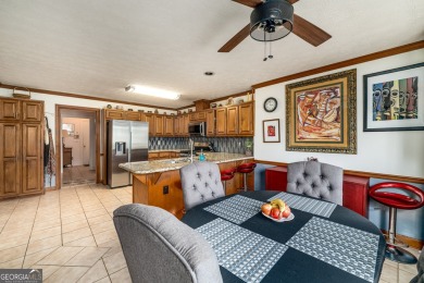 This beautiful ranch-styled home is nestled in the Exclusive on Southland Country Club in Georgia - for sale on GolfHomes.com, golf home, golf lot
