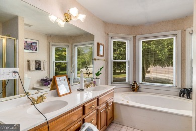 This beautiful ranch-styled home is nestled in the Exclusive on Southland Country Club in Georgia - for sale on GolfHomes.com, golf home, golf lot