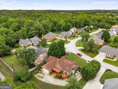 This beautiful ranch-styled home is nestled in the Exclusive on Southland Country Club in Georgia - for sale on GolfHomes.com, golf home, golf lot