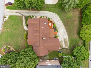 This beautiful ranch-styled home is nestled in the Exclusive on Southland Country Club in Georgia - for sale on GolfHomes.com, golf home, golf lot