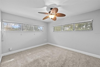 Experience serene, resort-style living in this stunning estate on Babe Zaharias Golf Course in Florida - for sale on GolfHomes.com, golf home, golf lot