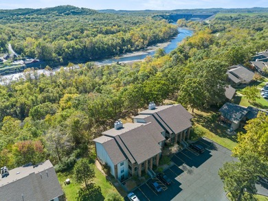 This bright and fully updated 2-bedroom, 2-bath condo offers on Pointe Royale Village Country Club in Missouri - for sale on GolfHomes.com, golf home, golf lot