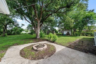 Experience serene, resort-style living in this stunning estate on Babe Zaharias Golf Course in Florida - for sale on GolfHomes.com, golf home, golf lot