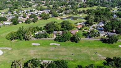 Experience serene, resort-style living in this stunning estate on Babe Zaharias Golf Course in Florida - for sale on GolfHomes.com, golf home, golf lot