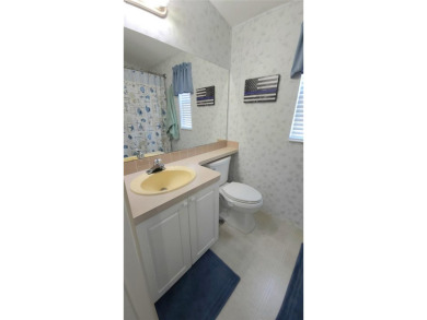 WELL KEPT ONE BEDROOM, TWO BATHROOM MOBILE HOME IN ACTIVE 55+ on River Run Golf Links in Florida - for sale on GolfHomes.com, golf home, golf lot