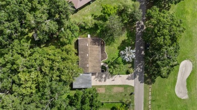 Experience serene, resort-style living in this stunning estate on Babe Zaharias Golf Course in Florida - for sale on GolfHomes.com, golf home, golf lot